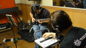 Fede is playing slide guitar